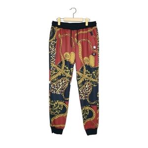 Reason Black, Red, Gold Leopard Chain Print Jogger Pants